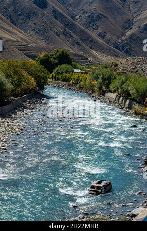 Panjshir river flowing through the Panjshir Valley, Afghanistan Stock Photo