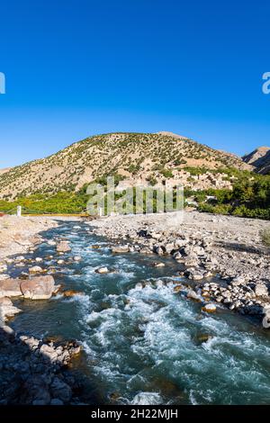 Panjshir river flowing through the Panjshir Valley, Afghanistan Stock Photo