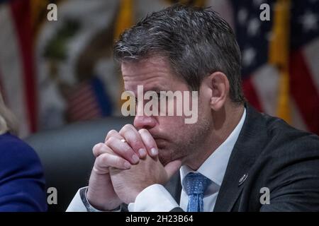 United States Representative Adam Kinzinger (Republican of Illinois) listens as the House select committee tasked with investigating the January 6th attack on the Capitol meets to hold one of former President Donald Trump's allies in contempt, former strategist Steve Bannon in the Canon House Office Building in Washington, DC, USA on Tuesday, October 19, 2021. Photo by Rod Lamkey/CNP/ABACAPRESS.COM Stock Photo