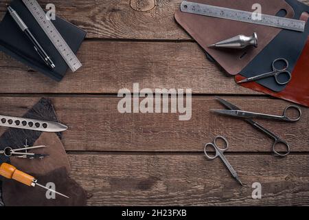 Leather crafting. Tools flat lay still life Stock Photo