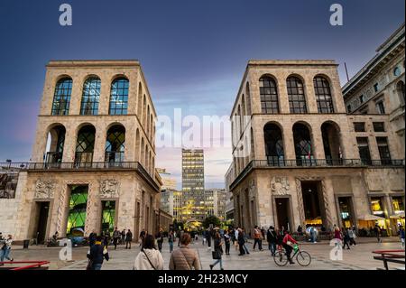 View of Piazza del Duomo with the Martini building in the background, A lot of people at Piazza del Duomo in the old part of Milan town. Stock Photo
