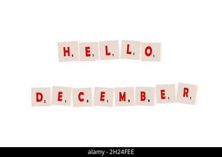 Hello December, word in wooden block letters isolated on white background. Christmas Quote. Stock Photo