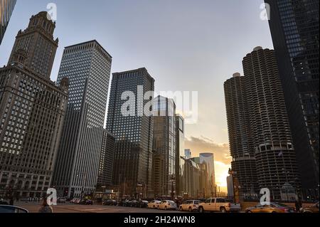 United States, Illinois, Chicago: low angle view of skyscrapers and office buildings along the Loop from E Wacker Drive, in the early morning. Stock Photo