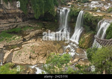 The Wangcun Waterfall separates the ancient town of Furong in Hunan Province, China. Stock Photo