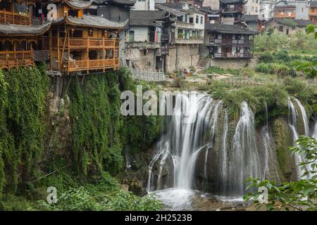 The Wangcun Waterfall separates the ancient town of Furong in Hunan Province, China. Stock Photo