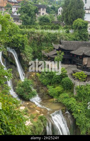 The Wangcun Waterfall separates the ancient town of Furong in Hunan Province, China. Stock Photo