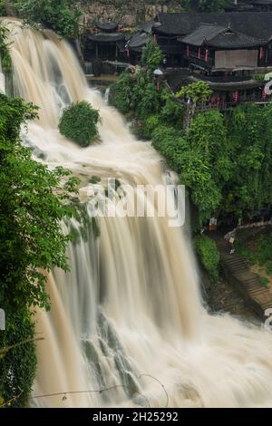 The Wangcun Waterfall separates the ancient town of Furong in Hunan Province, China. Stock Photo