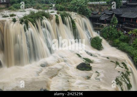 The Wangcun Waterfall separates the ancient town of Furong in Hunan Province, China. Stock Photo