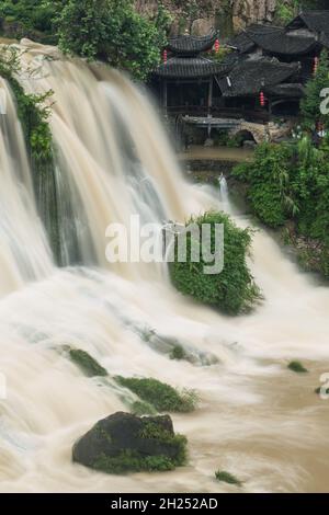 The Wangcun Waterfall separates the ancient town of Furong in Hunan Province, China. Stock Photo