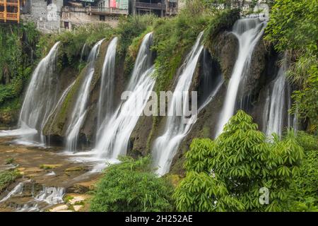 The Wangcun Waterfall separates the ancient town of Furong in Hunan Province, China. Stock Photo