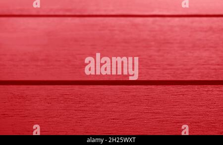 Closeup the Texture of Horizontal Patterned Wooden Plank Surface in Amaranth Red Stock Photo