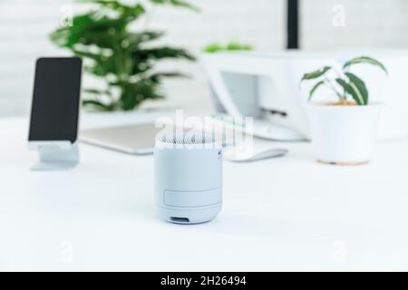 small bluetooth speaker portable on workspace Stock Photo