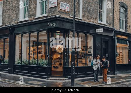 London, UK - October 02, 2021: Aesop shop in Covent Garden, a popular tourist area in London with lots of shops and restaurants, women look for direct Stock Photo