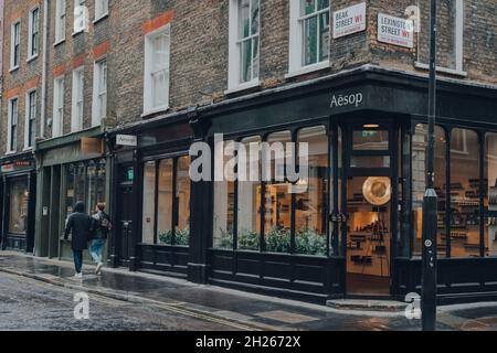 London, UK - October 02, 2021: Aesop shop in Covent Garden, a popular tourist area in London with lots of shops and restaurants, in the rain, few peop Stock Photo