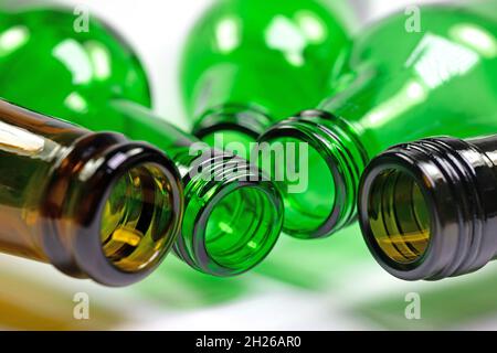 Empty glass bottles in the colors green and brown Stock Photo