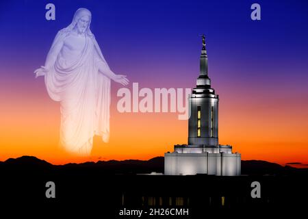 Pocatello Idaho LDS Mormon Latter-day Saint Temple with lights at sunset Angel Moroni and Jesus looking arms out Stock Photo