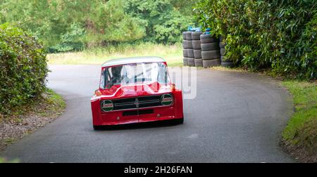 Racing Minis at Wiscombe Park Hillclimb in Devon UK. All are specially modified to suit the demands of racing against the clock on a 900yd uphill sprint Stock Photo