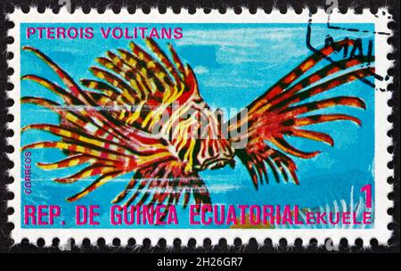 EQUATORIAL GUINEA - CIRCA 1975: a stamp printed in Equatorial Guinea shows Red Lionfish, Pterois Volitans, Tropical Fish, circa 1975 Stock Photo
