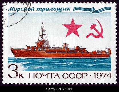 RUSSIA - CIRCA 1974: a stamp printed in the Russia shows Mine Layer, Soviet Warship, circa 1974 Stock Photo