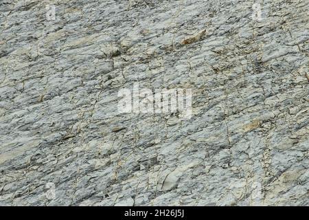 Textured stone wall as background Stock Photo