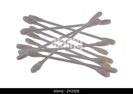 Pile of several white cotton buds with plastic material in isolation on a white background, the concept of health, beauty, and hygiene Stock Photo