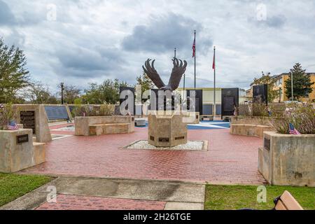 Freedom statue eagle centered in the Santa Rosa County Veterans Memorial Plaza in downtown Milton, Florida Stock Photo