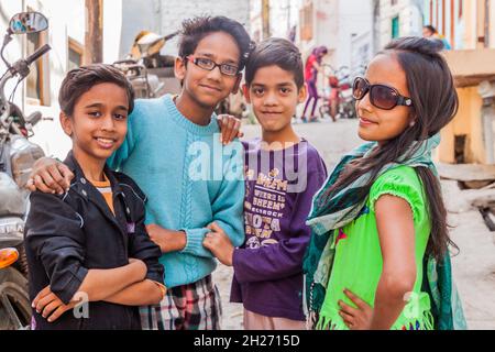 UDAIPUR, INDIA - FEBRUARY 11, 2017: Local children on a street in Udaipur, Rajasthan state, India Stock Photo