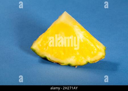 pineapple slice on blue background Stock Photo