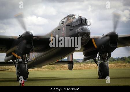 Battle of Britain, memorial flight Lancaster Bomber running engine checks at Duxford Airfield, Cambridgeshire Stock Photo