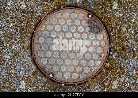sewer with honey pattern on the lid Stock Photo