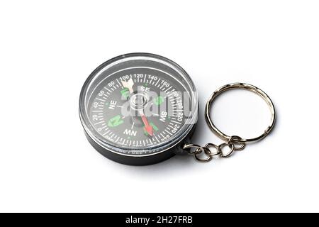 Keychain compass isolated on white background Stock Photo