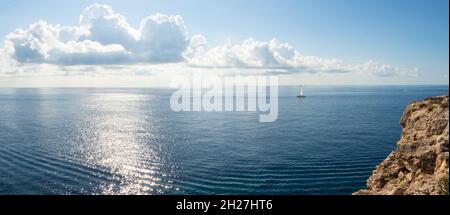 panorama of ocean looking into sun in Can Pastilla near Palma Mallorca Spain Stock Photo