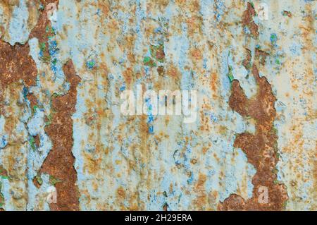 iron doors in the foreground rusty and useless Stock Photo