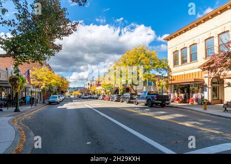 Shops and cafes on Sherman Street in the lakeside downtown area of the rural mountain city of Coeur d'Alene at autumn. Stock Photo