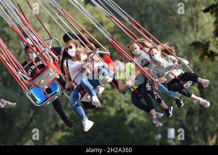 Karussell im Olympiapark München in der Reihe 'Sommer in der Stadt' anstatt des abgesagten Oktoberfestes - Carousel in the Munich Olympic Park in the Stock Photo