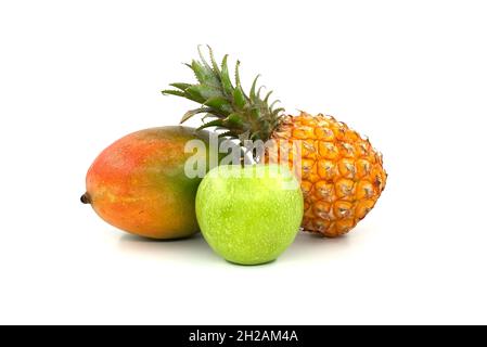 Whole mango, pineapple fruit and apple isolated on a white background Stock Photo