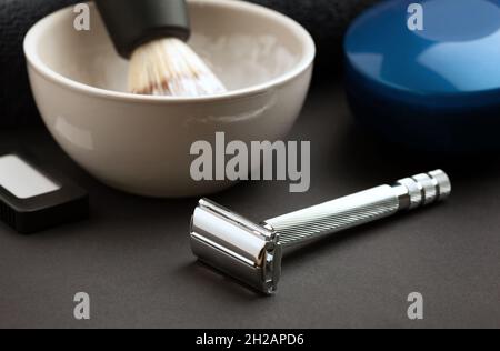 Set of accessories for classic men's wet shaving on black background. Stock Photo