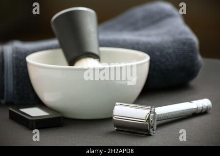 Set of accessories for classic men's wet shaving on black background. Stock Photo