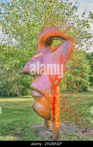 'Vertical Face II' by Rick Kirby, in the sculpture garden at Burghley House, Stamford, England. Stock Photo