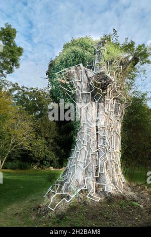 Decorated dead tree in the sculpture garden at Burghley House, Stamford, England. Stock Photo