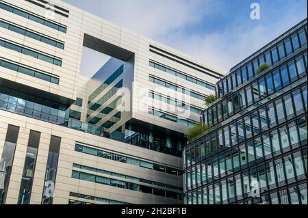 Part of the USB AG bank's building with another one next to it viewed from Broadgate Circle, London, England. Stock Photo