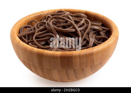 Cooked soba noodles in a bamboo bowl isolated on white. Stock Photo