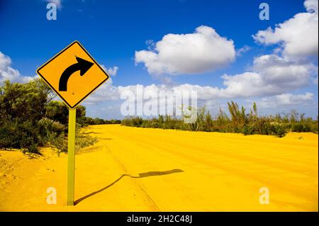 Traffic sign 'curve' at a dust road in the Kalbarri National Park, Australia, Western Australia, Kalbarri National Park Stock Photo