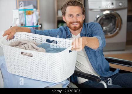 Man Lifting Very Large Laundry Bag Stock Photo - Download Image Now - Laundry  Bag, Laundry Basket, Men - iStock