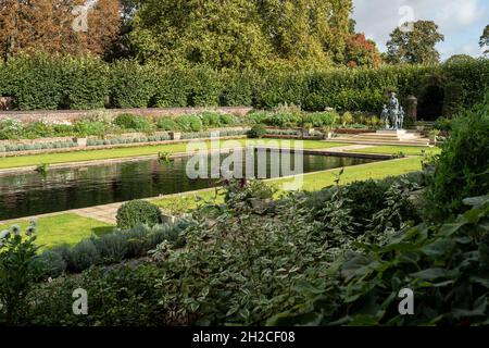 LONDON: The Princess Diana Memorial Garden at Kensington Palace in London. The statue is of Princess Diana with a group of children Photo: David Levenson/Alamy Stock Photo