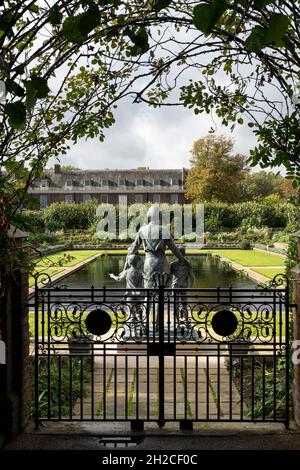 LONDON: The Princess Diana Memorial Garden at Kensington Palace in London. The statue is of Princess Diana with a group of children Photo: David Levenson/Alamy Stock Photo