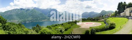 Italy, Lombardy. Lake Como, branch of Lecco, seen from the town of Civenna with heliport Stock Photo