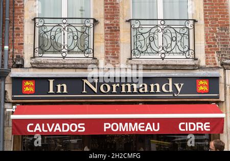 Honfleur, France - August 4, 2021: A store In Normandy with typical alcoholic and non-alcoholic beverages in Normandy: calvados, ciders and apple juic Stock Photo