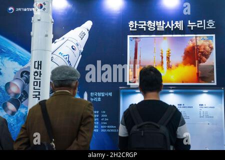 People watch the launch of The Korean Satellite Launch Vehicle II