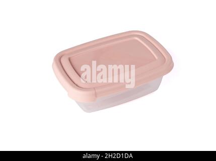 Plastic food storage container with pink lid isolated on white background. Food box for lunch. Close up Stock Photo